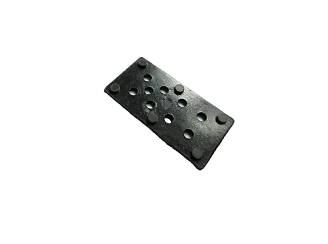 Rectangular domino piece with black dots.